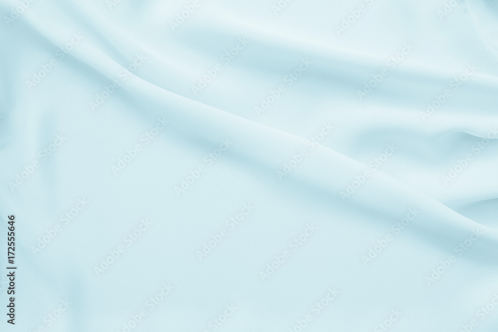 Blue waving fabric texture background Blue waving fabric texture background