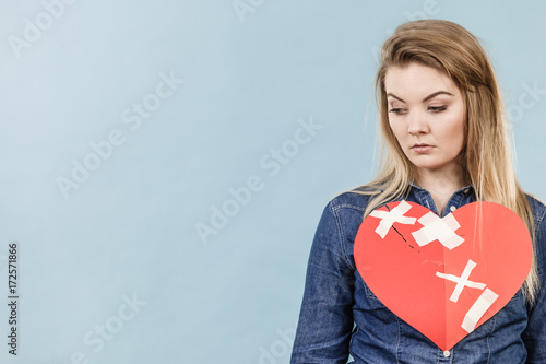 Young woman with broken heart