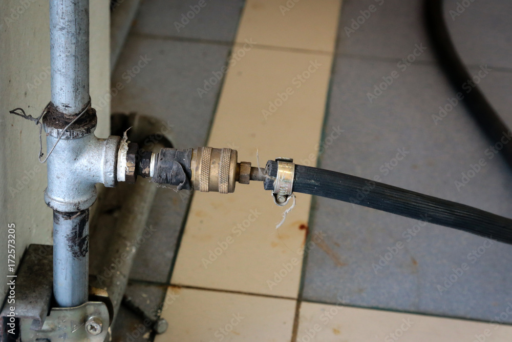 Air compressor tube for used fix car and Motobike in the garage. Air compressor tube for used fix car and Motobike in the garage.