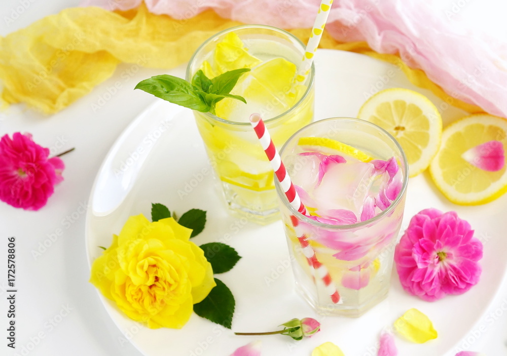 Homemade rose lemonade on white background.top view