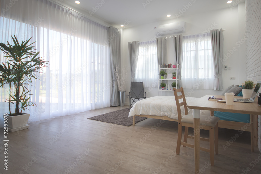 Fototapeta premium White bedroom interior.