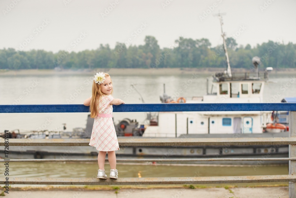 Pretty Girl. Portrait on the background of a river. Pretty Girl. Portrait on the background of a river.