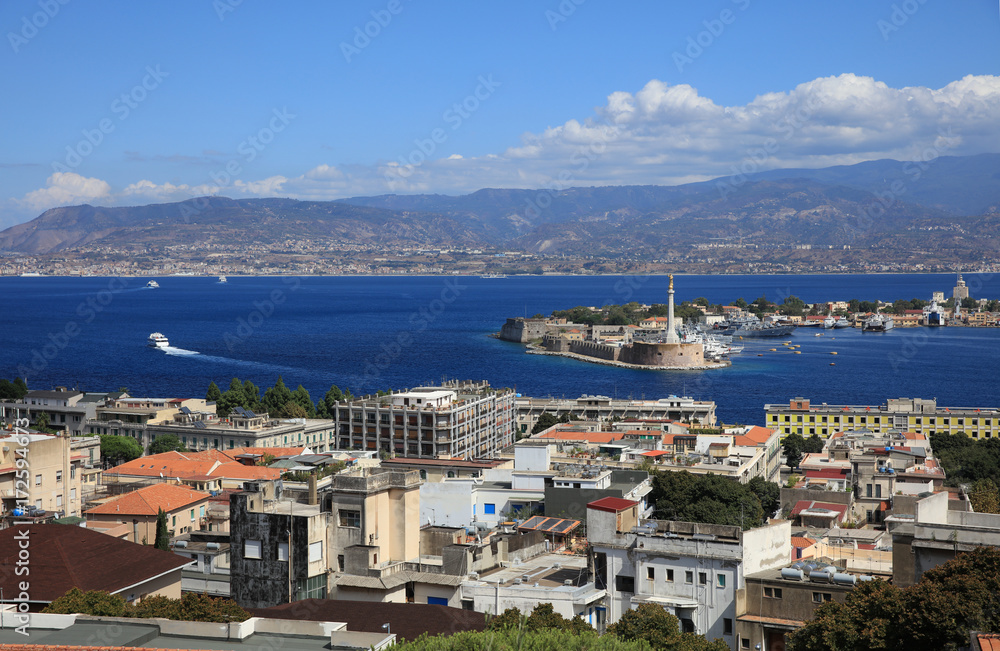 Port of Messina with the gold Madonna della Lettera statue. Sicily. Italy