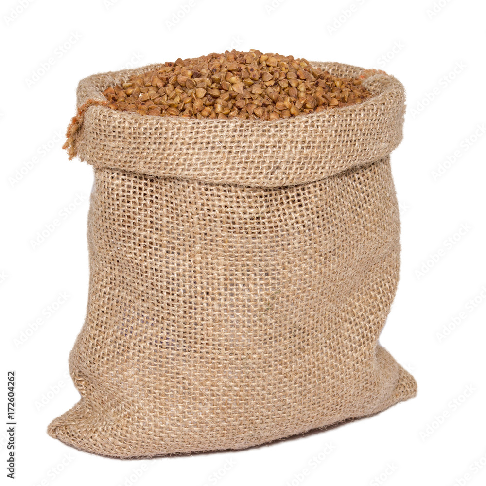 Buckwheat in bag from sacking isolated on white background