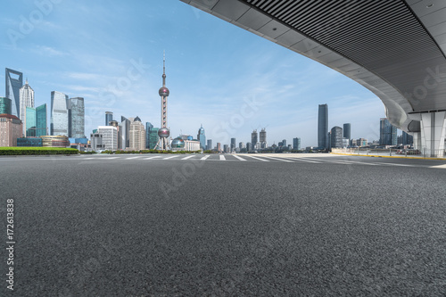 empty urban road with modern building in shanghai