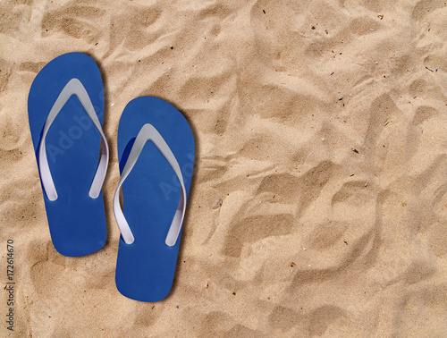 Two blue man lifestyle relax flip flops on orange sandy beach