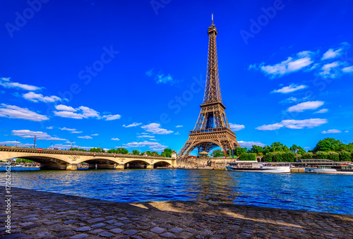 Paris Eiffel Tower and river Seine in Paris, France. Eiffel Tower is one of the most iconic landmarks of Paris. © Ekaterina Belova