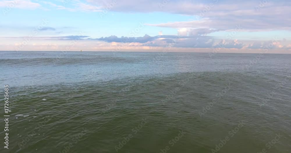 AERIAL: smooth waves. At low altitude. Lateral movement AERIAL: smooth waves. At low altitude. Lateral movement