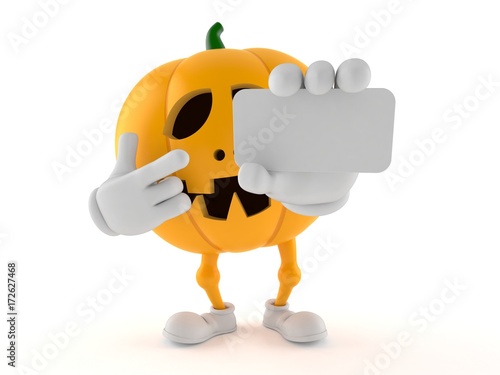 Halloween pumpkin character holding blank business card