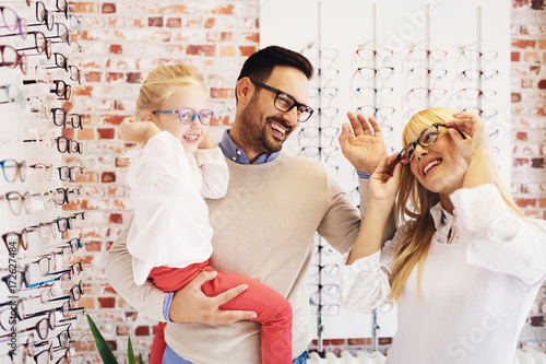 Family in optics store photo