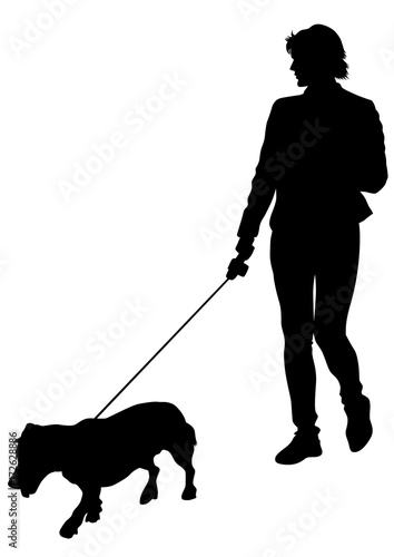 Young woman with a small dog on a white background