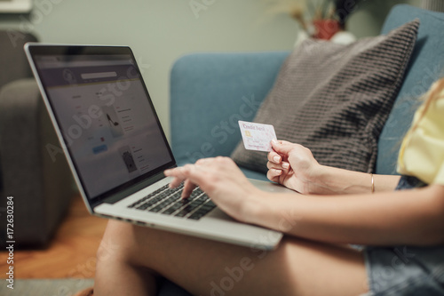 Woman Using Credit Card for Online Payment © LStockStudio