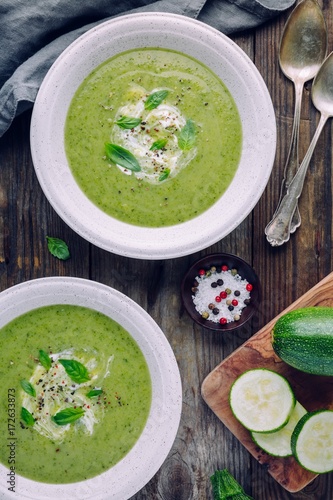 green vegetable cream soup puree with zucchini and basil