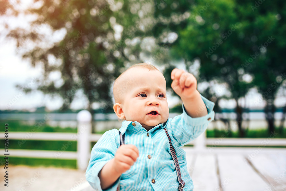 Little cute boy playing outdoor in the park Little cute boy playing outdoor in the park