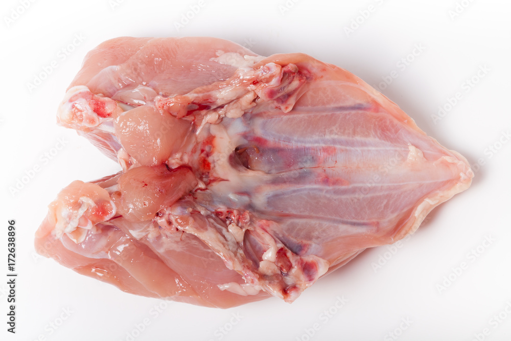 Raw chicken breast on light background