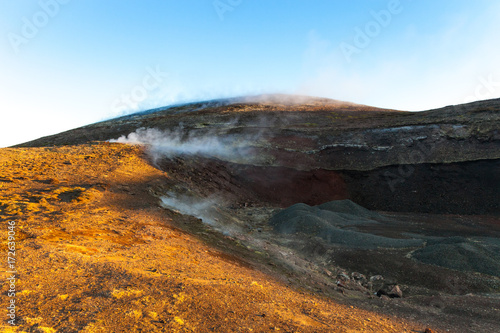 Steam from thermal springs in the desert landscape of Iceland