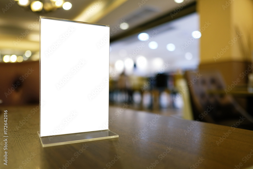 Mock up Menu frame standing on wood table in Bar restaurant cafe. space for text. Mock up Menu frame standing on wood table in Bar restaurant cafe. space for text.