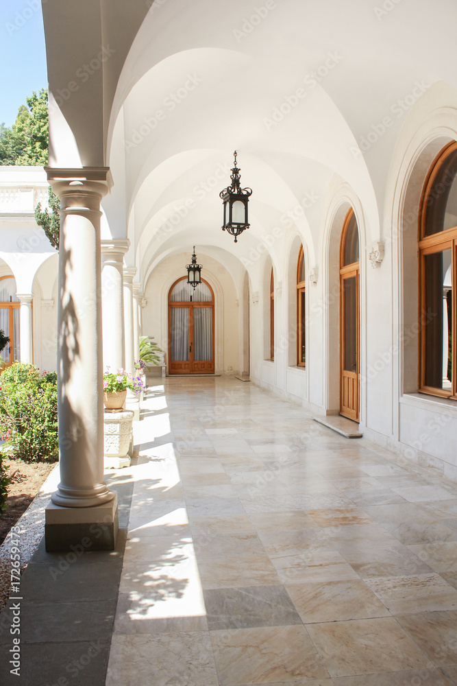 White gallery of the courtyard.