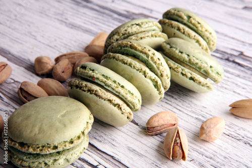 Sweet and colourful french macaroons or macaron with pistachio