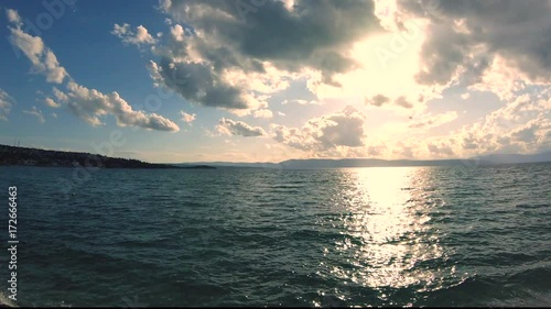 Sunset over the sea time lapse