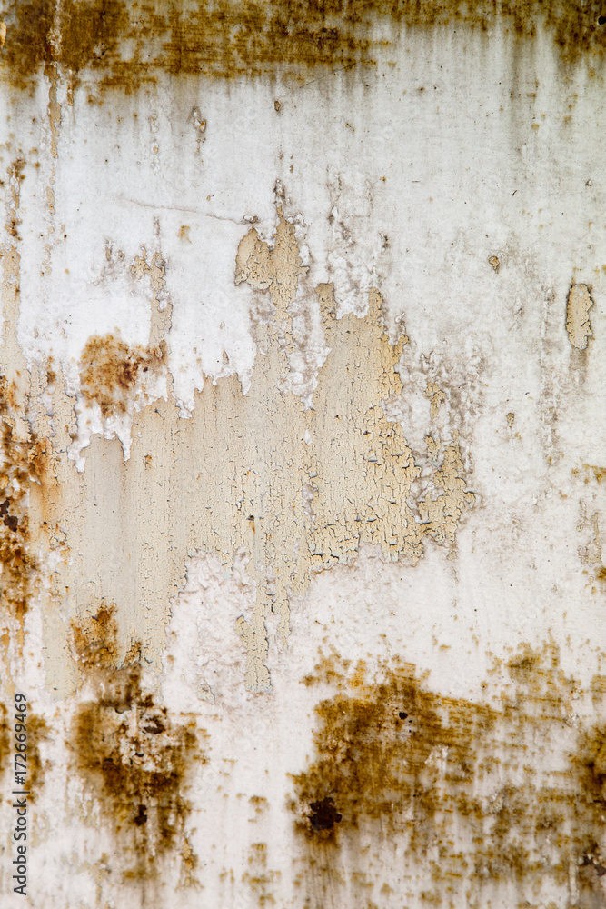 background of rusty metal painted with cracked paint