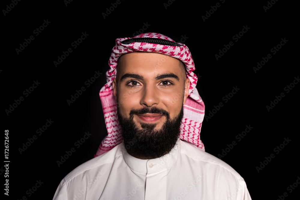 muslim man looking at camera muslim man looking at camera