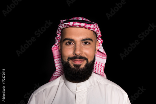 muslim man looking at camera