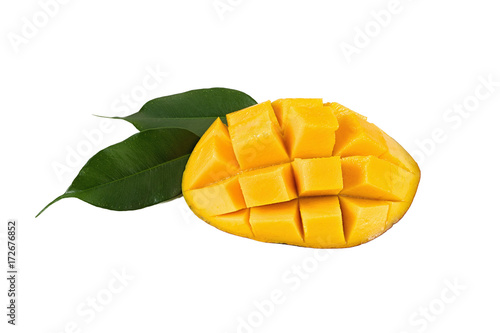 A piece of mango with leaves on white background