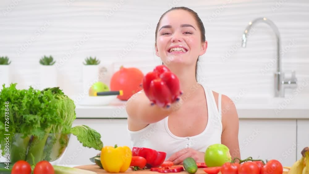 Beauty young woman holding fresh vegetables. Organic food. 4K UHD video footage. Ultra high definition 3840X2160 Beauty young woman holding fresh vegetables. Organic food. 4K UHD video footage. Ultra high definition 3840X2160