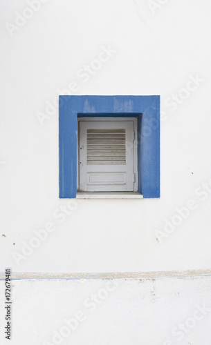 old blue painted wooden window © Wojtek