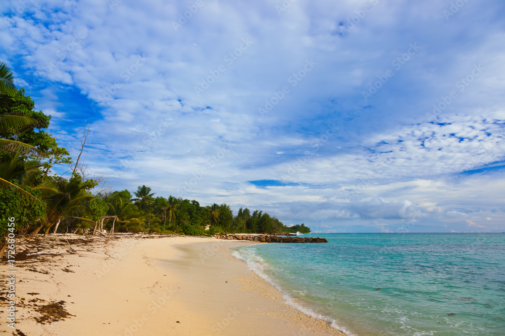 Seychelles tropical beach at sunset