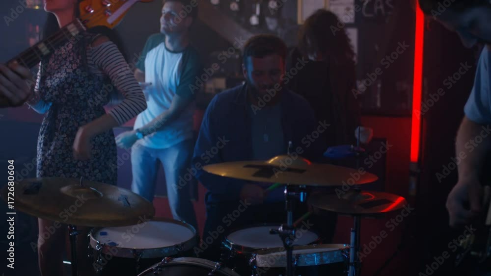 Live band performing for young nightclub crowd Live band performing for young nightclub crowd