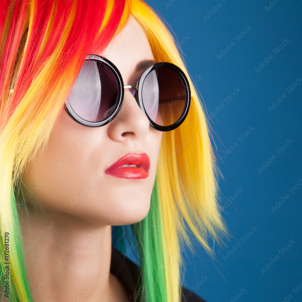 beautiful woman wearing color wig and sunglasses beautiful woman wearing color wig and sunglasses