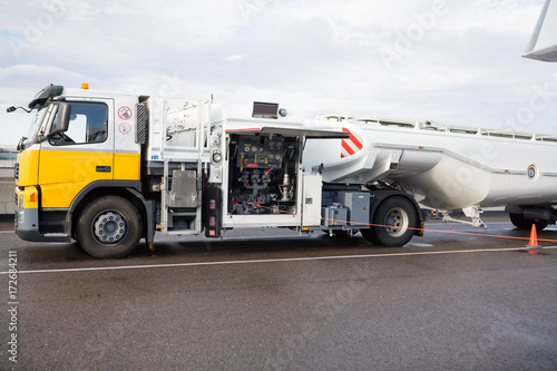 Fuel Truck On Wet Runway At Airport