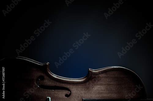 Violin musical instruments of orchestra closeup on black