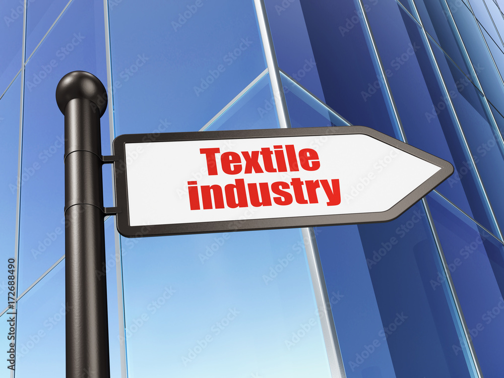 Manufacuring concept: sign Textile Industry on Building background Manufacuring concept: sign Textile Industry on Building background