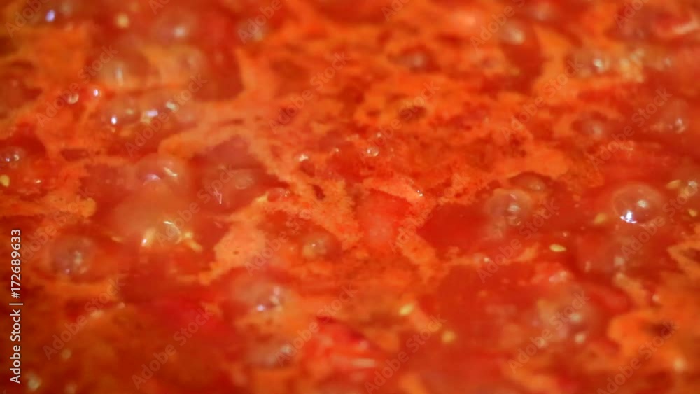 Cooking delicious tomato sauce closeup Cooking delicious tomato sauce closeup