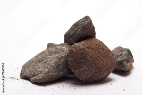 Canvas Print stones with sand on white background/stones to sand/isolated objects