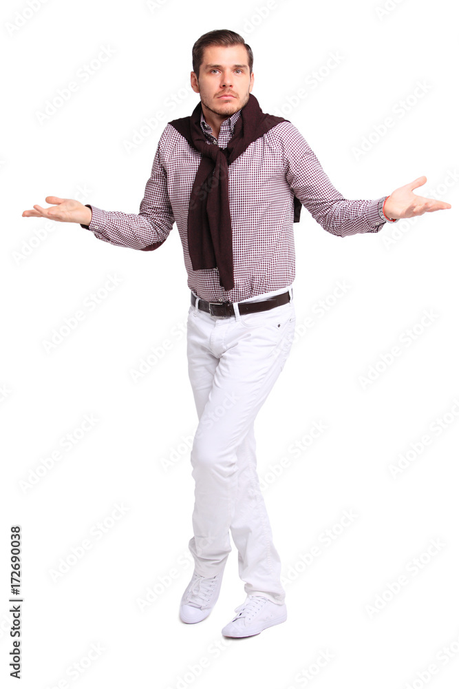 Happy smiling young man presenting and showing your text or product isolated on white Happy smiling young man presenting and showing your text or product isolated on white