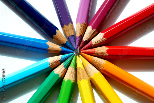 Various colored pencils gathered in the center.
