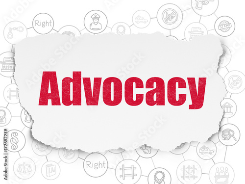 Law concept: Advocacy on Torn Paper background