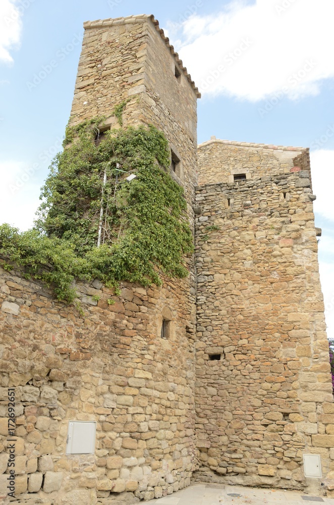 Stone towers in medieval village of Peratallada, Girona, Spain Stone towers in medieval village of Peratallada, Girona, Spain