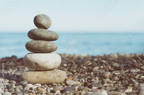 Stack Of Balanced Stones On The Beach