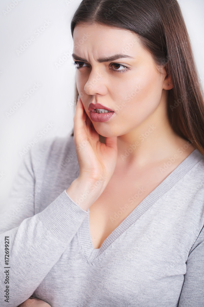 Woman In Pain. Beautiful Girl Feeling Toothache, Jaw, Neck Pain Woman In Pain. Beautiful Girl Feeling Toothache, Jaw, Neck Pain