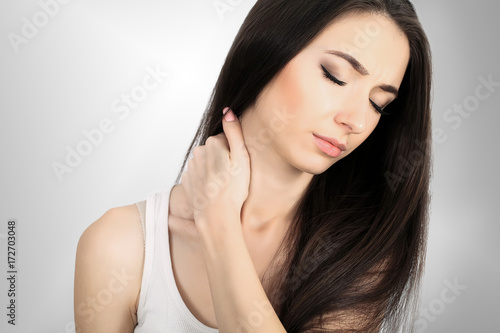 Throat Pain. Beautiful Woman Having Sore Throat, Feeling Sick. Unhappy Ill Female Suffering From Painful Swallowing, Strong Pain In Throat, Holding Hand On Her Neck. Health Concept. High Resolution