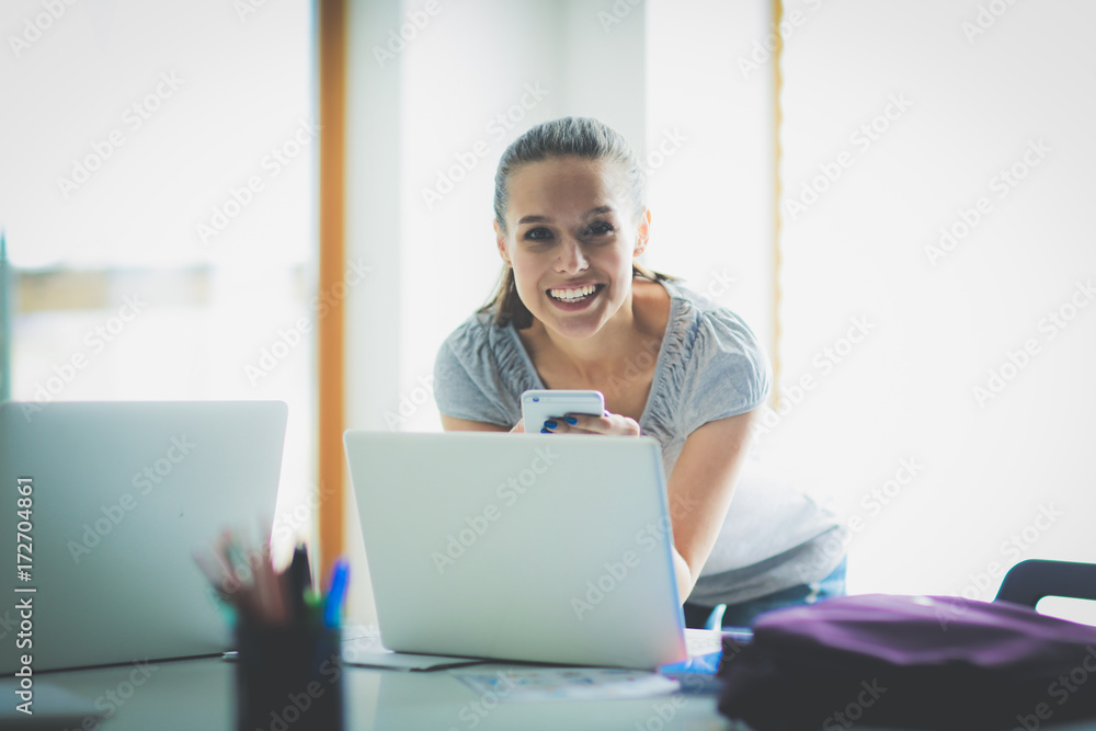 Woman use of mobile phone in university. Student woman Woman use of mobile phone in university. Student woman