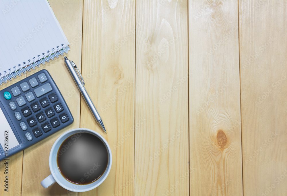 Top view office table with paper and coffee and calculator and pen for business and copy space. Top view office table with paper and coffee and calculator and pen for business and copy space.