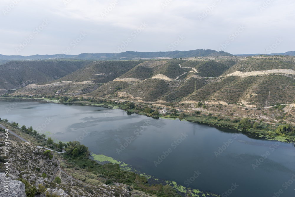 The river Ebro on its way through Mequinenza, Aragon The river Ebro on its way through Mequinenza, Aragon