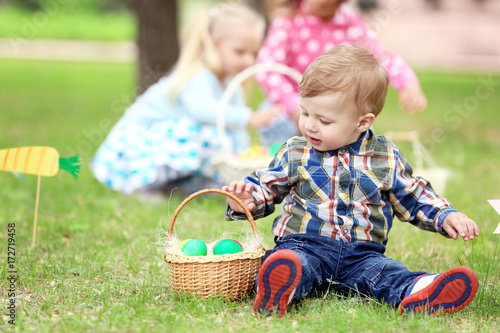 Cute little boy with basket...