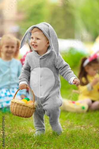 Cute little boy with basket...